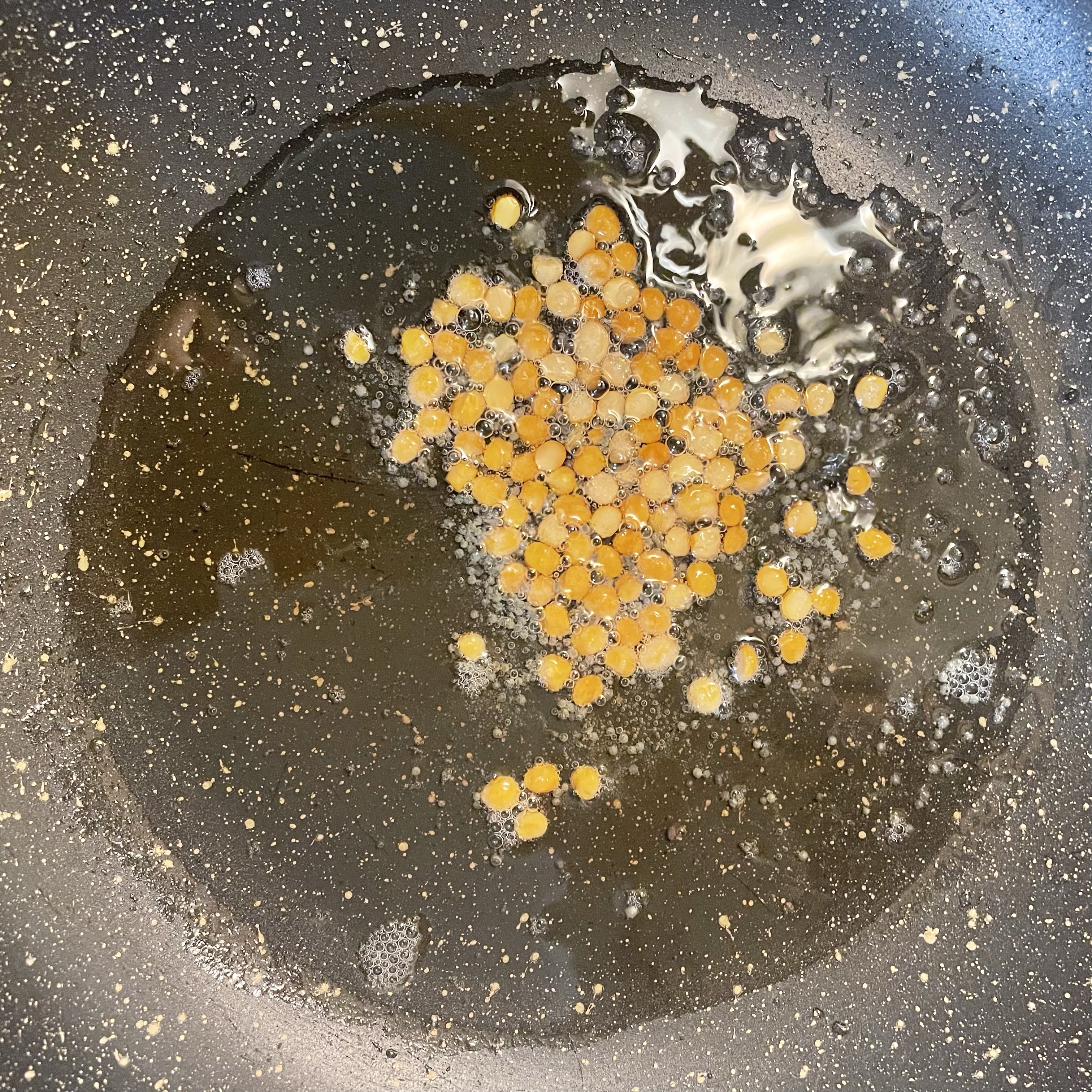 Saute mustard seeds and chana dal